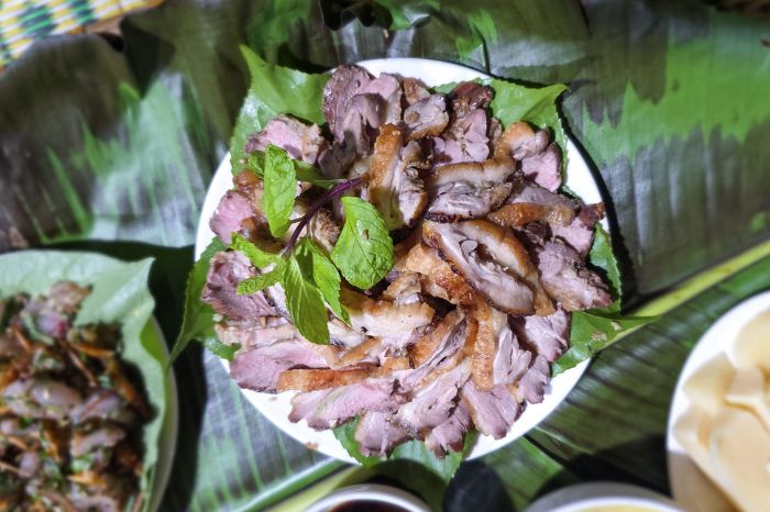 Grilled Lam Thuong duck, a traditional specialty of Yen Bai Province, Vietnam.