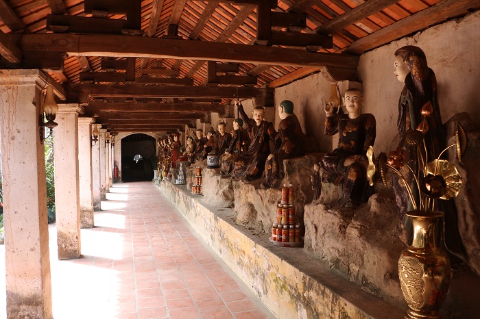 nom village close to hanoi nom pagoda statues