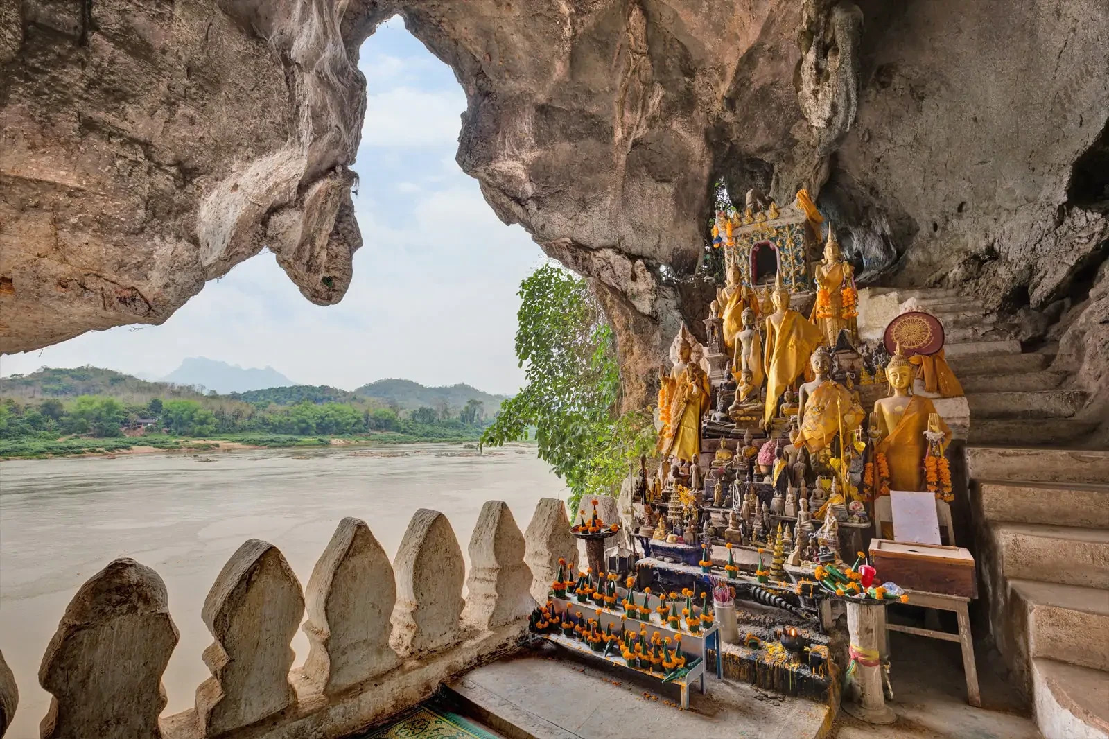  pak ou caves, what to visit luang prabang, how to get to pak ou caves, pak ou caves luang prabang, what to see in the pak ou caves, best time to visit the pak ou caves, Luang Prabang's must-visit sites