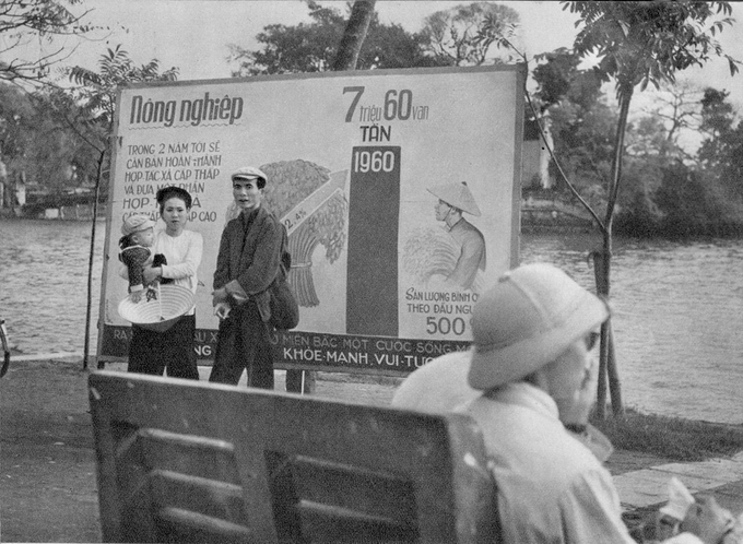 visit hanoi old quarter propaganda board